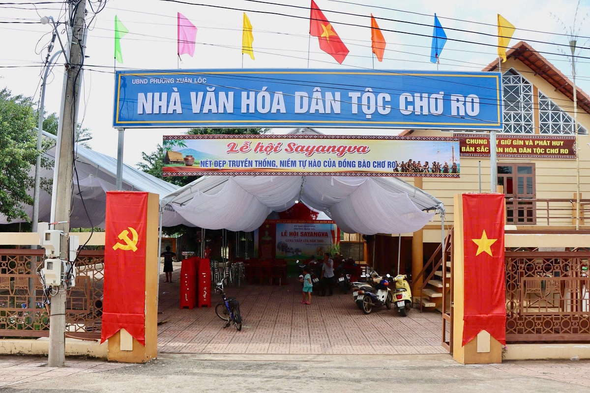 'A large white tent with flags and a sign

AI-generated content may be incorrect.'
