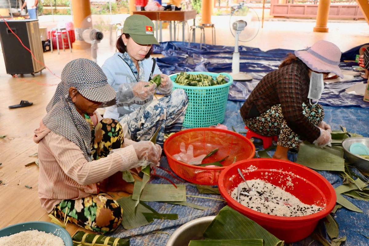 'A group of women making food

AI-generated content may be incorrect.'